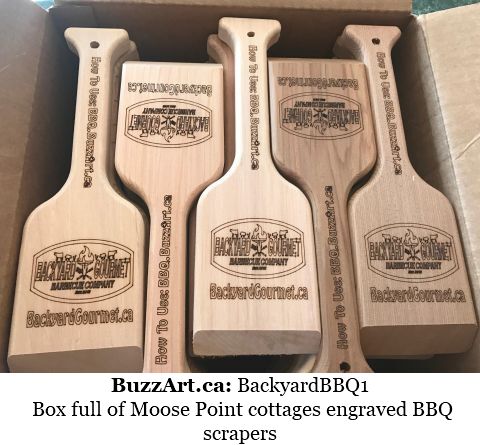 Box full of Moose Point cottages engraved BBQ scrapers